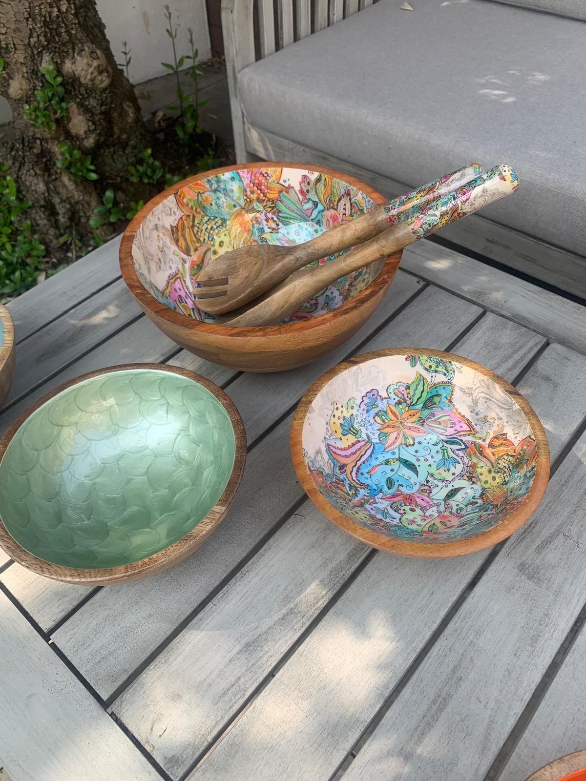 medium & large bowl set with matching salad servers. With a small, green hand-painted bowl. Made from sustainable mango wood. With a multi-coloured floral pattern