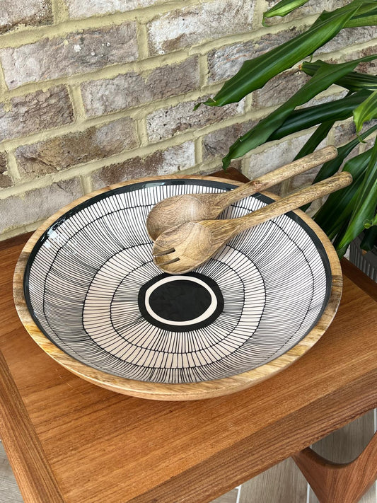 Black and white abstract circles design on a large bowl (38cm diameter) made of sustainable mango wood. For use to serve cold food or as a stunning decorative home interiors piece