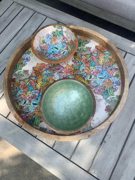 Small bowl Made from sustainable mango wood.  With a multi-coloured floral pattern.  Matching tray and small hand-painted  green bowl with fish scales design. 