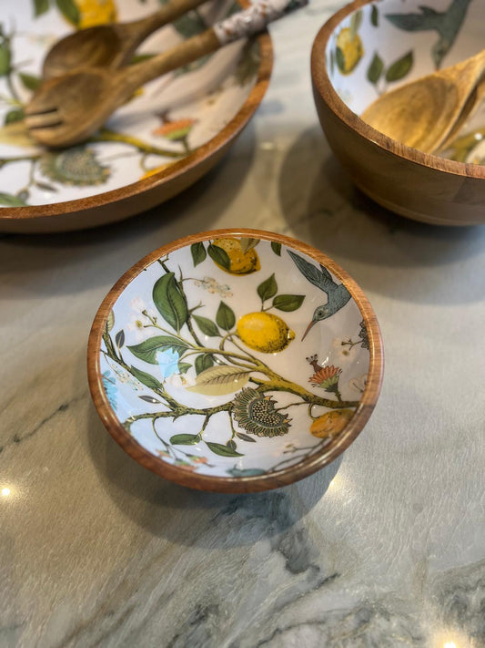 Small bowl featuring a lemon bird design.  Suitable for summer dining.  Hand-made from sustainable mango wood