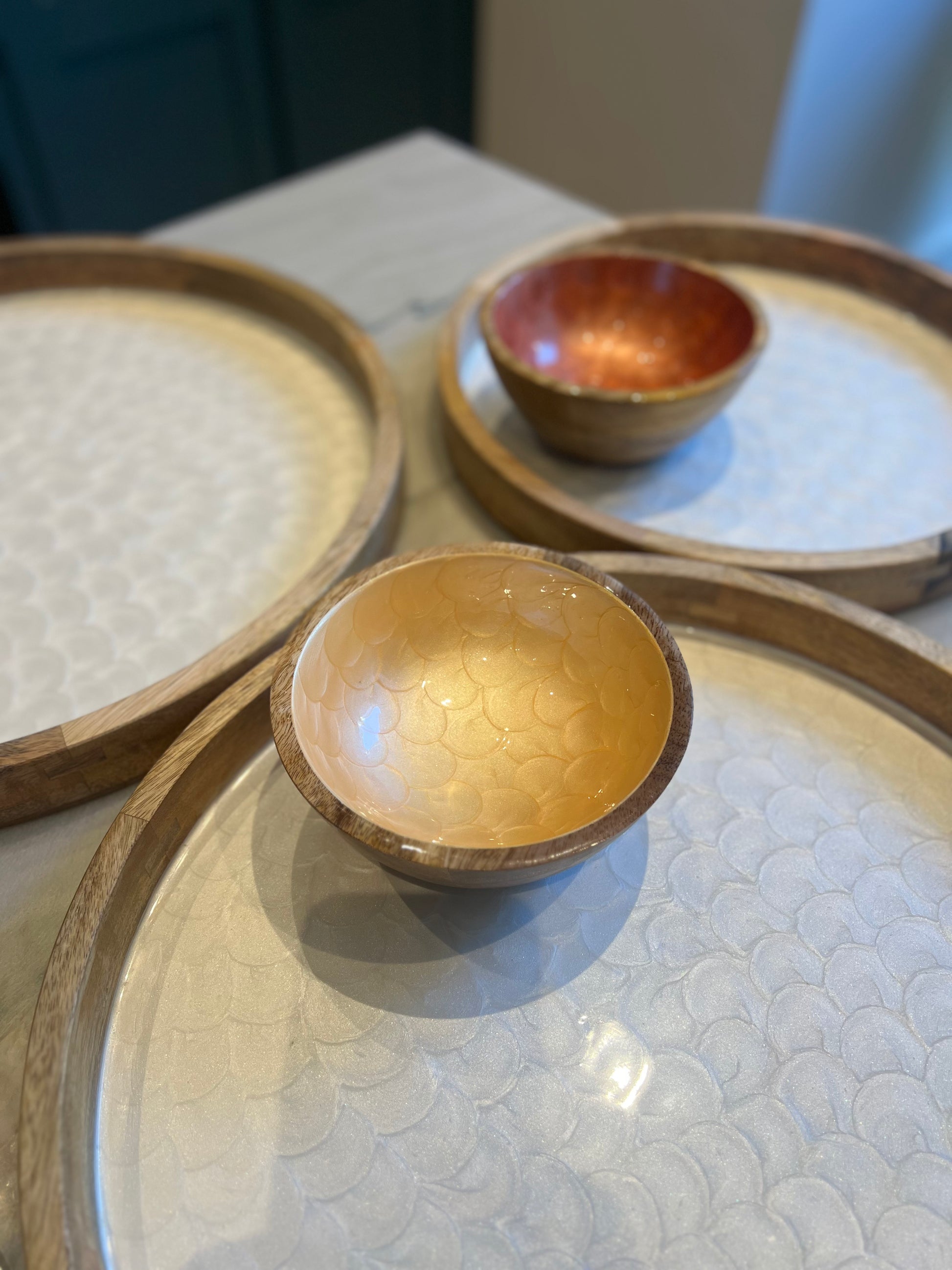 Set of three handpainted white trays with fishscale pearl finish.  Medium, large and extra large sizes.  Photographed with small handpainted bowls in various colours