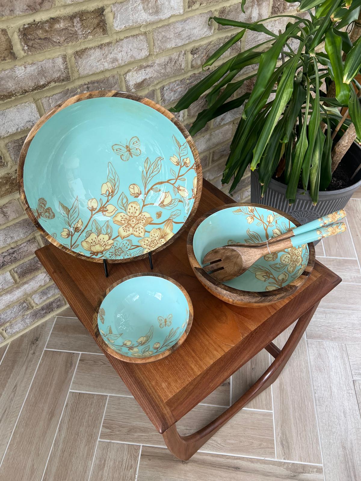 Set of 3 wooden salad bowls with a japanese style floral pattern in teal with a tea stain finish.  Made from sustainable wood.  3 sizes: small 18cm diameter, medium 25cm diamter, large 35cm diameter.  With matching salad spoon & fork with decorated handles