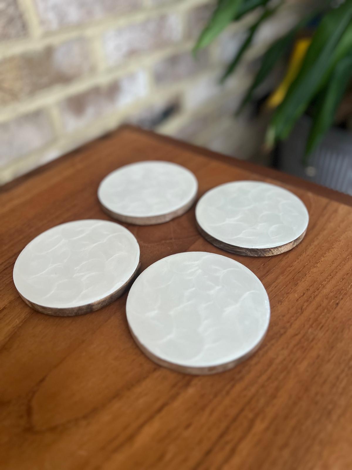 Set of 4 white hand-painted coasters with fish scale design