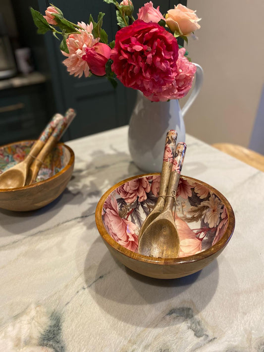Medium bowl with matching salad servers.  This design features unfurling peonies in dusty rose pink & cream hues.  Also featuring subtle tones of grey & green. Made from sustainable mango wood