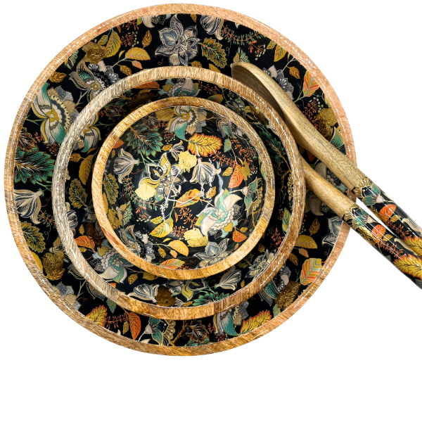 Small, medium and large bowls with matching salad servers.  This elegant floral design in black features stunning accents of gold foil. made from sustainable mango wood