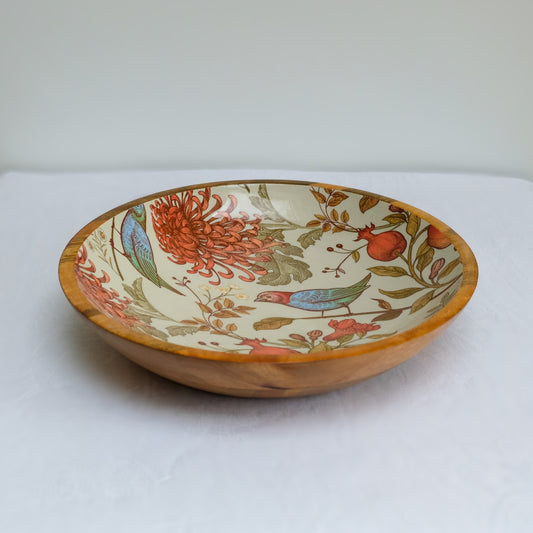 Large statement bowl (38cm) with a William Morris inspired orange bird design. Made with sustainable mango wood. Suitable as a fruit bowl or salad bowl.