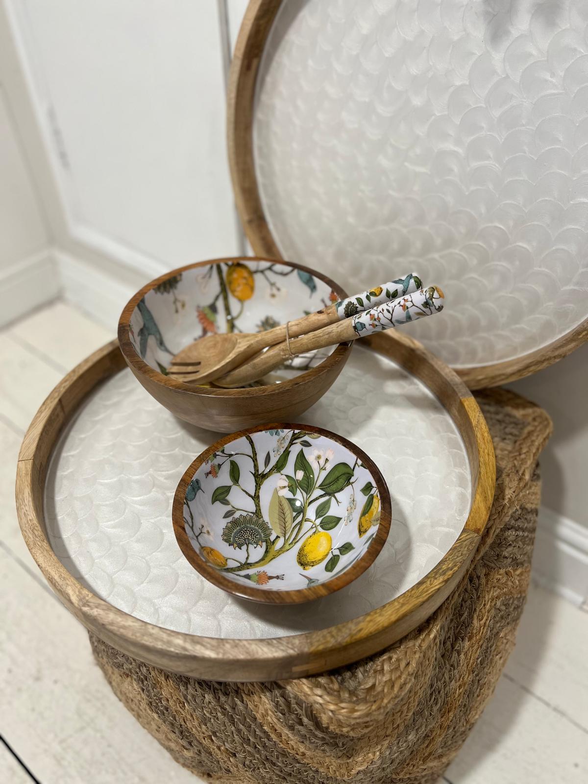 2 bowls with matching salad servers placed on a handpainted white tray with fishscale appearance
