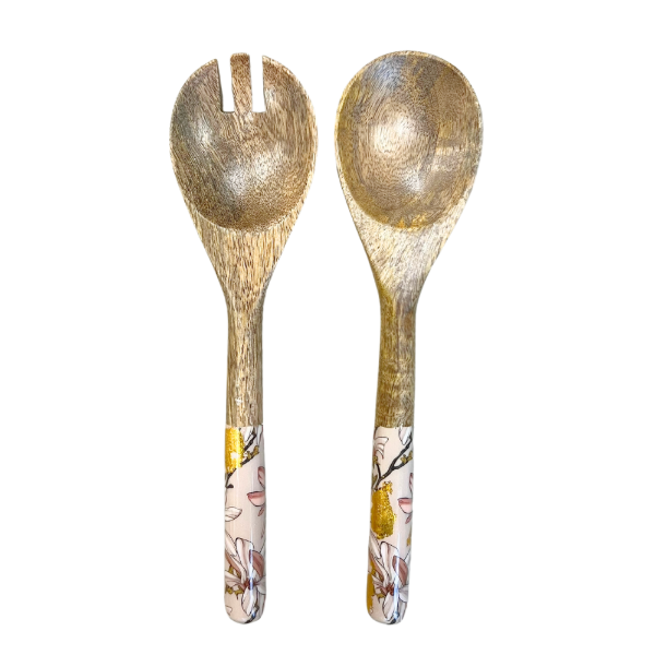 salad servers with decorated handles.  Designed to match magnolia design bowl