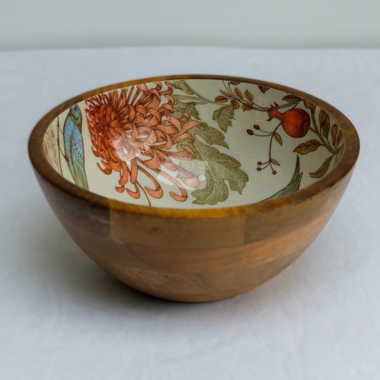 Medium sized bowl (25cm) with a William Morris inspired orange bird design. Made with sustainable mango wood. Suitable as a stylish fruit bowl or salad bowl with matching servers.