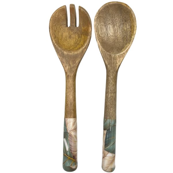 Matching salad servers made from sustainable mango wood.  Monstera cheese plant design in blue green and light beige