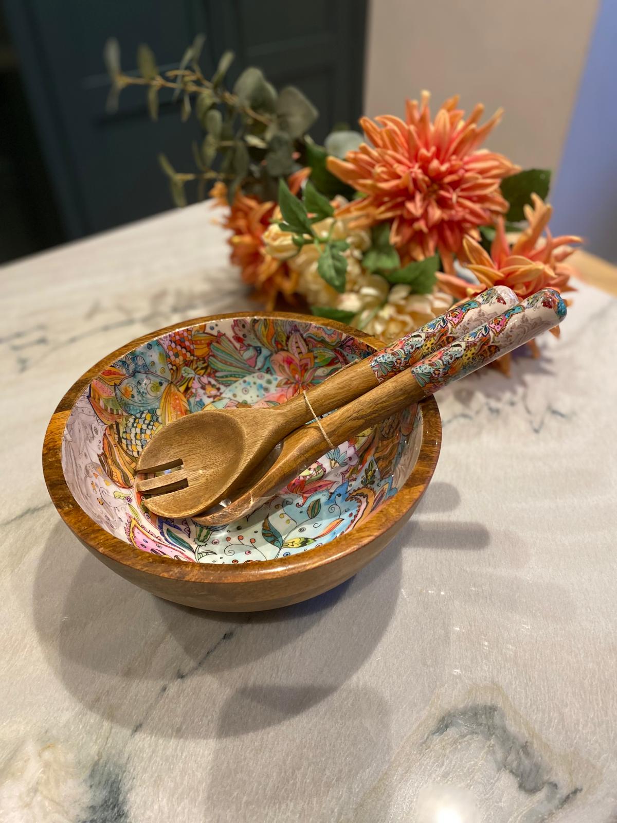 Medium bowl with matching salad servers.  Modern Multi-coloured flower design. Made from sustainable mango wood